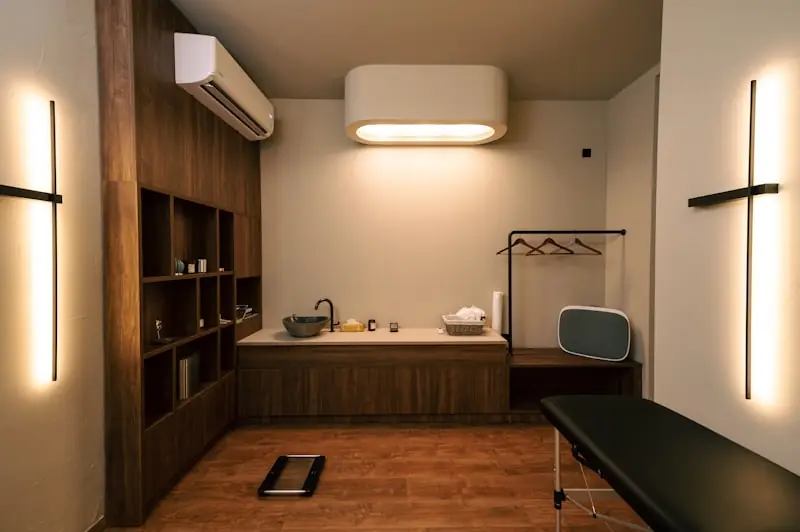 A consultation room with a desk and chair.