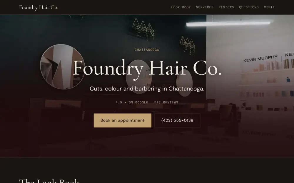 Home page of the Foundry Hair Co. demo site. Salon chairs facing round mirrors on a dark wall.