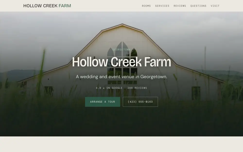 Home page of the Hollow Creek Farm demo site. A white barn standing in a field of yellow wildflowers under open sky.