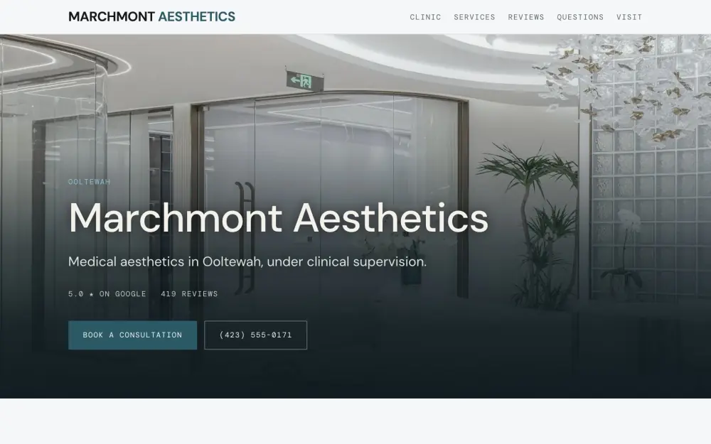 Home page of the Marchmont Aesthetics demo site. A treatment room with a bed made up beside a vessel sink.