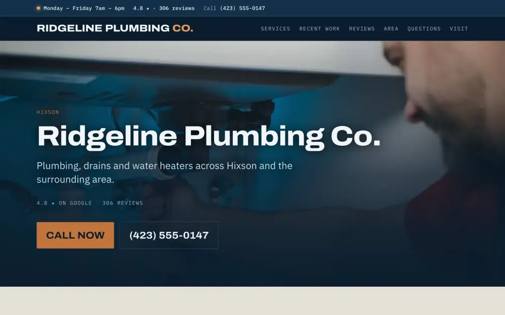 Home page of the Ridgeline Plumbing Co. demo site. A plumber working on copper pipework opened up inside a wall.